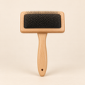 Brosse de toilettage en bois